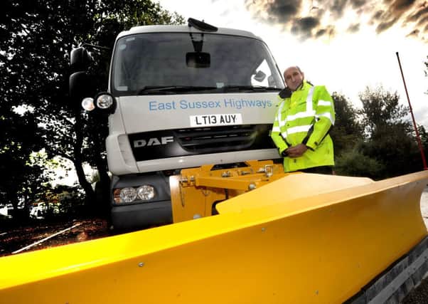 Roger Williams (Head of Highways) pictured with a gritter, Ringmer Depot. 11/10/13