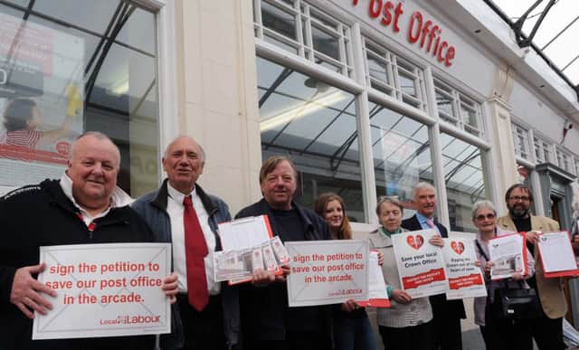 Campaigners earlier this year protested against plans to potentially close or move Littlehampton's Post Office