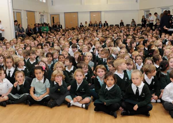 W41050H13 Children in assembly at the Vale First and Middle School