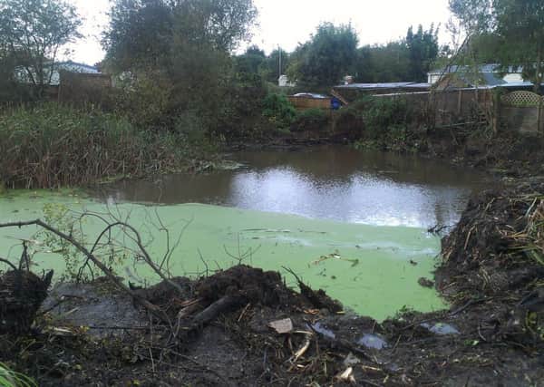 Asbestos fears at a pond in Climping have been raised by parish councillors