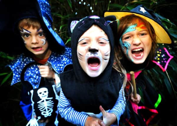 Halloween at Borde Hill. Felix, Lawrence and Bea Carter. Pic Steve Robards