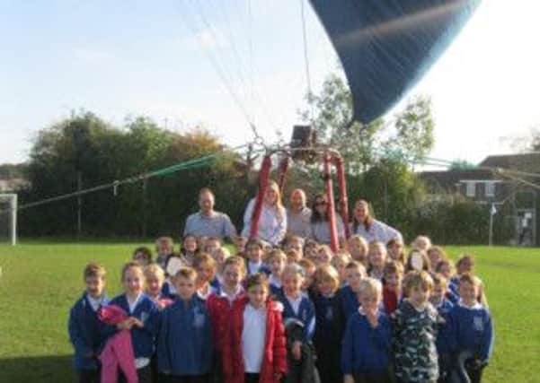 Birchwood Grove School pupils and staff with hot air ballooon
