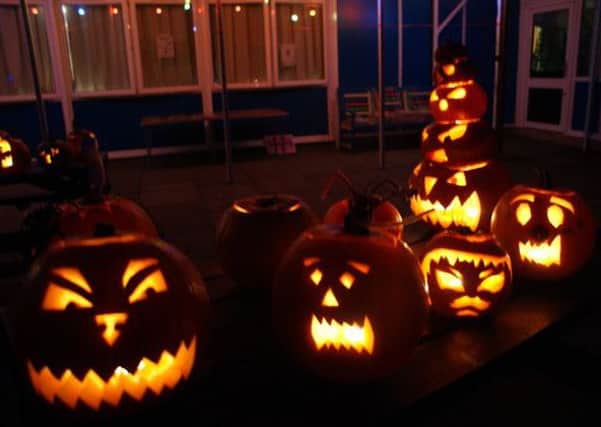 Lit up, the pumpkins created a spooky atmosphere for the disco