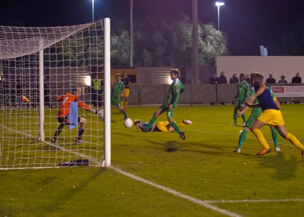 Ben Johnson glances in the Rocks' opener at Thamesmead  Picture by Tommy McMillan