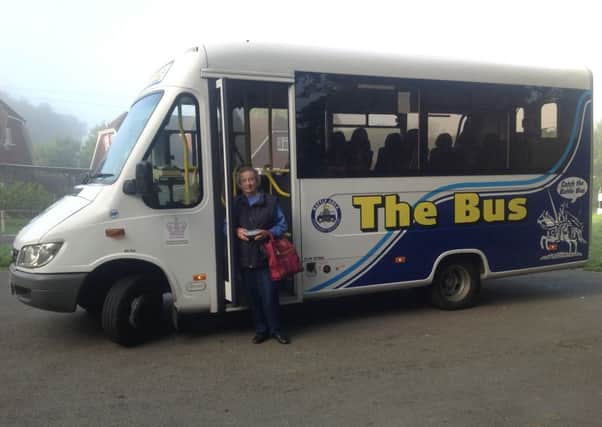 Jean Brown boarding The Bus at Broad Oak. The Bus is part of the new look Battle Area Community Transport fleet.
