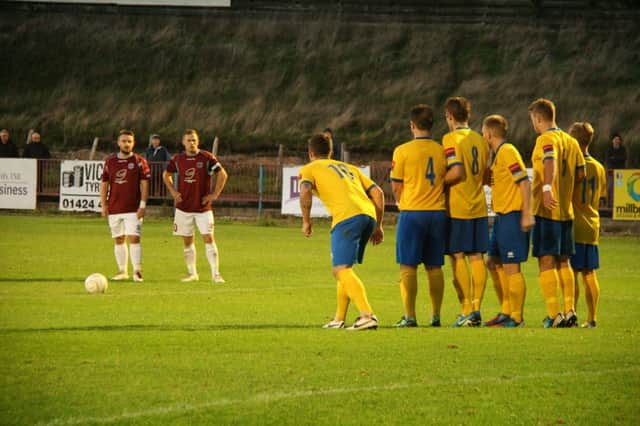 Jordan Woodley and Sam Adams line-up a free kick during Hastings United's 1-0 loss at home to AFC Sudbury last weekend. Picture by Terry S. Blackman