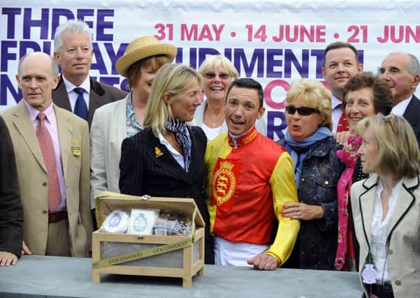 Frankie Dettori with GROG racing manager Gail Brown and GROG members after Goodwood Mirage's home-track victory  Picture by Malcolm Wells 131663-6420