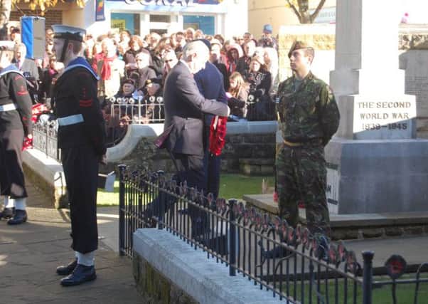 Horsham MP Francis Maude lays a wreath during the Remembrance Sunday