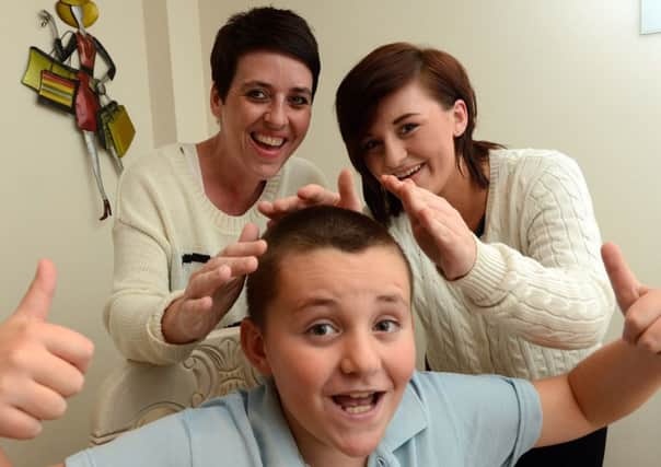 Scott Bowden with his mum Julia and sister Paige