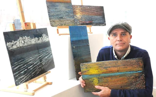 C131529-1 Bog Nov14 Martin  phot kate

Martin Snook with some of his work at the Cloudhopper Gallery.Picture by Kate Shemilt.C131529-1