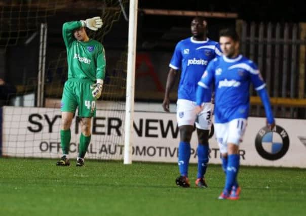 Keeper Trevor Carson, left, shows his frustration as the Blues crash to defeat at Newport Picture: Joe Pepler