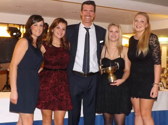 Greg Searle MBE with Bexhill Rowing Club's victorious ladies' junior four