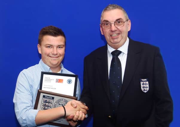 Matthew Weller winning an earlier award - this one from Sussex FA, presented by Tony Kybett
