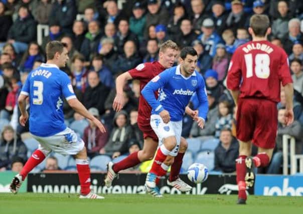 Ricardo Rocha in action for Pompey last season. Picture: Sarah Standing (13225-3901)