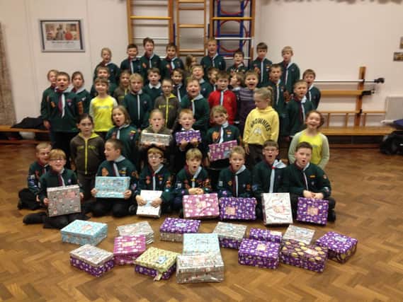 The Cubs and Brownies with the shoeboxes