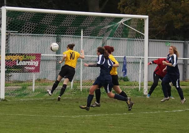 Lauren Cheshire scores against Wivelsfield  Picture by Darran Stevens