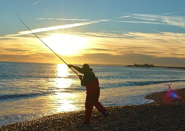 Kerry Saint casting during the Hastings & St Leonards International Sea Angling Two-Day Beach Festival