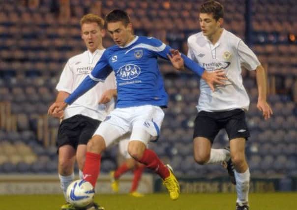 Ben Close on the ball for Pompey against Barton. Pic: Mick Young