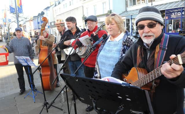 C131550-3 Bog Nov21 Typhoon  phot kate

The Skiffle band of the Bognor branch of the RAFA playing in Bognor precinct to raise money for the Philipine typhoon victims.Picture by Kate Shemilt.C131550-3