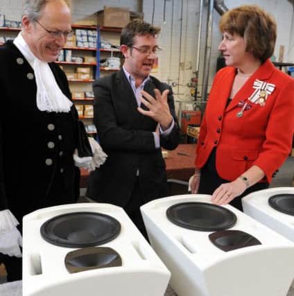 JPCT 171012 Turbosound in Partridge Green presented with Queens Award. Sales director Dominic Harter talking to the Lord-Lieutenant Susan Pyper and the High Sheriff of West Sussex Andrew John Stephenson Clarke . Photo by Derek Martin