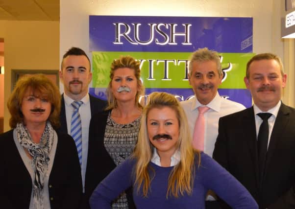 Staff at the Bexhill office of Rush, Witt & Wilson compete for the best Movember moustache
