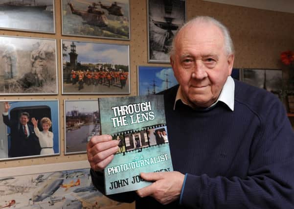 JPCT 281113 John Jochimsen, retired photojournalist written new book about his career. Photo by Derek Martin