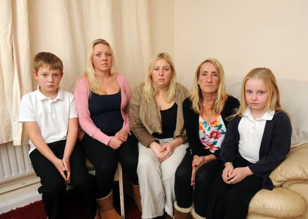 The family of Lindsay Campbell  who died after falling from the bucket of a digger, in Ford, are seeking justice after a coroner concluded that health and safety procedures on the building site he was working on was not good enough. (left to right), son Luke Campbell (ten), with daughters Charlene Campbell (23), Karen Withey (26), his wife Julie Campbell and daughter Chloe Campbell (eight)