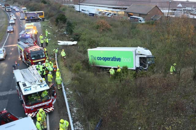 A lorry left the A27 this morning at Holmbush after crashing into a parked trailer