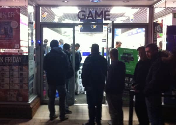 Gamers queue outside Horsham's Game store last night