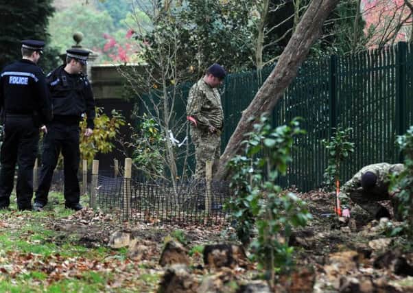 Army Bomb Disposal squad investigate explosive device possibly a hand granade found at Tilgate Park (Pic by Jon Rigby)