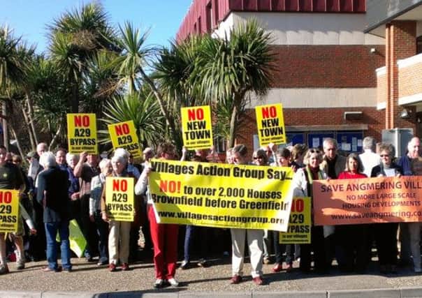 Campaigners from Angmering, and from Barnham, Eastergate and Westergate, demonstrating outside Arun Civic Centre against large-scale housing developments