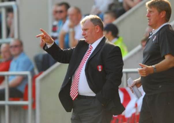 Rotherham boss Steve Evans with assistant Paul Raynor