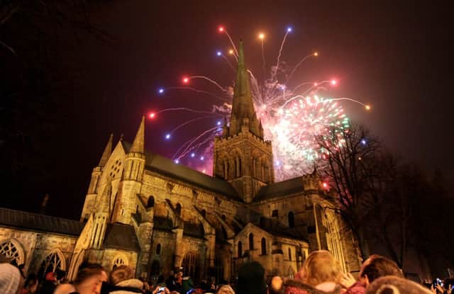 The cathedral spire looking stunning as a backdrop to the fireworks    

Picture by Louise Adams   C131544-2