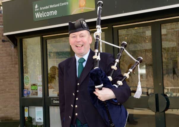Andrew Wheeler playing Scottish bagpipes in Arundel                                  L49145H13