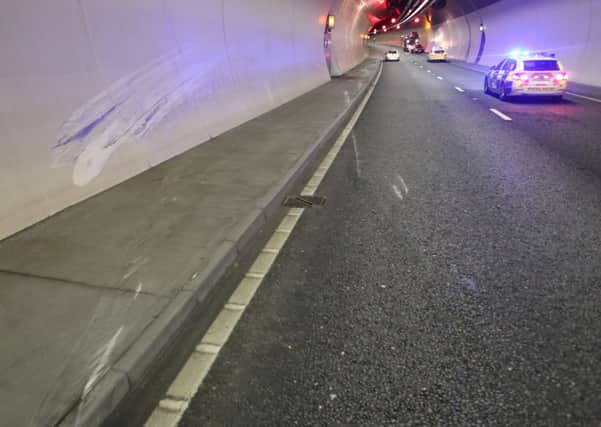 Marks on the side wall in the Southwick Tunnel after a van rolled on Saturday