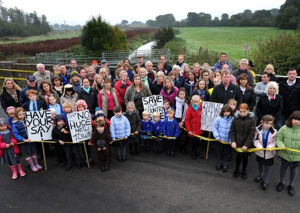 Wineham yellow ribbon demo against proposed new town in the area. Pic Steve Robards