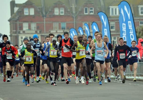 Runners set off in the 2013 Hastings Half Marathon. Picture by Steve Hunnisett
