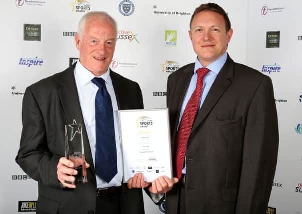 Mick Waghorn (left) receives his BBC Sussex Unsung Hero of the Year Award from BBC Sussexs Tim Durrans. Picture courtesy Stephen D. Lawrence Photography