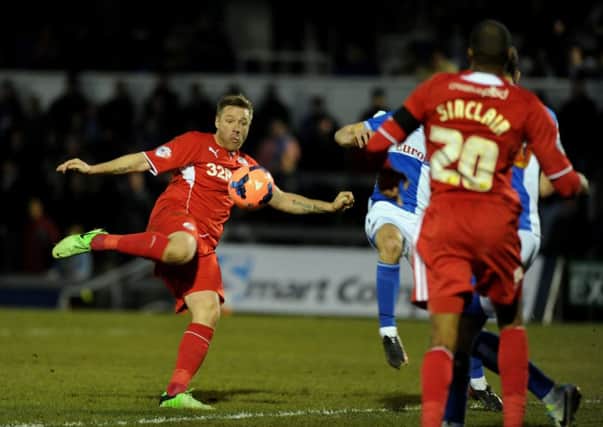 Crawley Town's Gary Alexander takes a shot against Bristol Rovers
