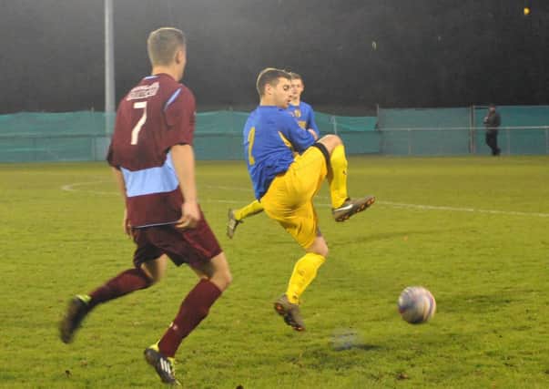 Action from Little Common's 6-1 win over Seaford Town on Saturday. Picture by Steve Hunnisett (eh50012d)