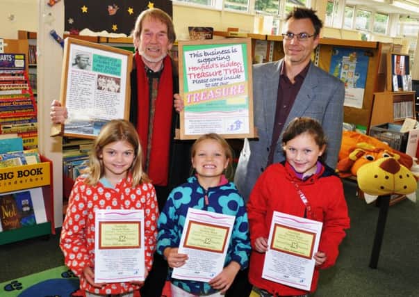 Beatrix Crowther (eight) and Florence Crowther(seven) of Fulking with Marcy Ferguson-Smith (eight) of Lancing with organiser Leo Jago (left) and Mark Whiting of AVS Fencing. Pic - Mike Beardall, Oakfield Media