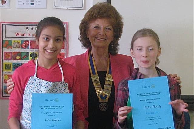 Young Chef Competition Winner Katie Appleton (left) and Runner-up Amelia McNeilly (right) with Rotary Club of Storrington & Pulborough District President, Mary Jagger.