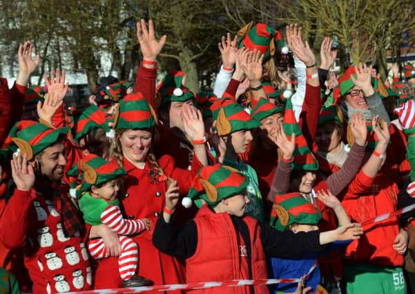 W50595H13  World record number of elves gather in Steyne Gardens