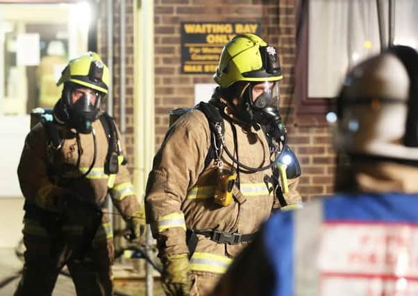 Firefighters used breathing apparatus while combating the blaze in Littlehampton            PHOTO: Eddie Mitchell