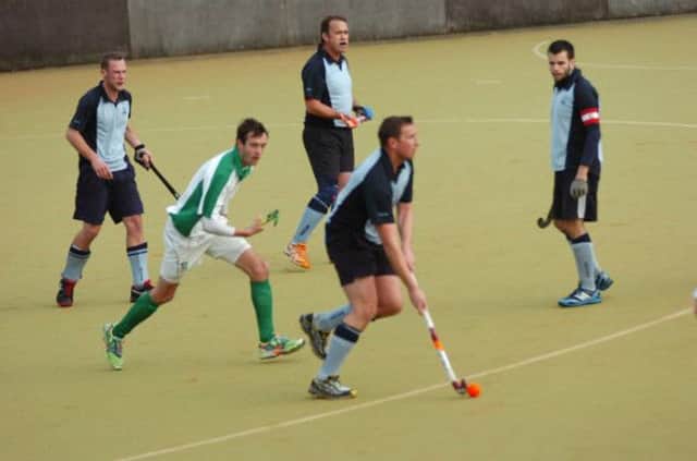 Dan Burnett on the ball for South Saxons in the 2-2 draw at home to Canterbury III. Picture by Simon Newstead
