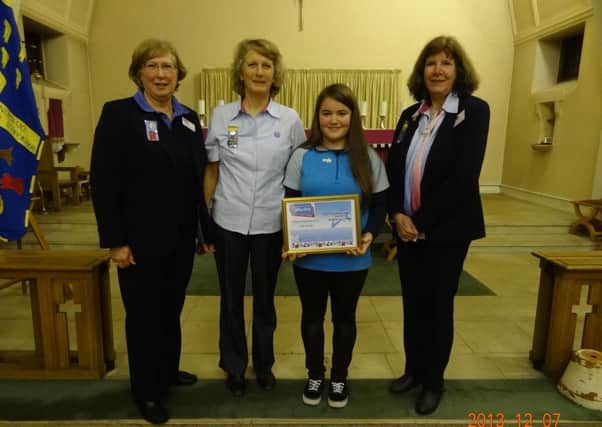 Diann Johnson, Haywards Heath Division Commissioner; Jill Holton, Leader 1st Haywards Heath Brownies; Holly Farrage, Young Persons Award recipient and Young Leader with the 1st Haywards Heath Brownies; and Deborah Phillips, Girlguiding Sussex Central County Commissioner.