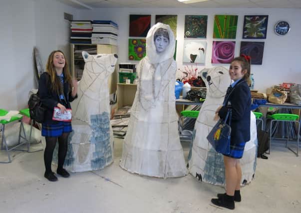 Students from Shoreham Academy with the sculptures