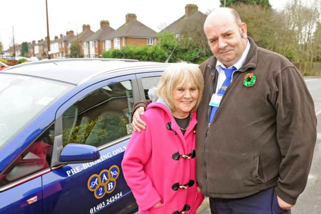 JPCT 171213 Adrian Brand and Pam Saggers (67). Pam's life was saved when Horsham cabbie Adrian leapt into action after she choked on her own vomit in his car. Photo by Derek Martin