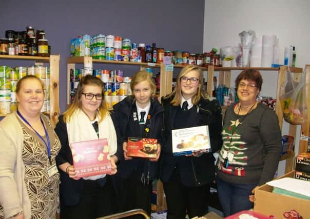 Mrs Knox and her students at the food bank