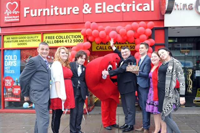 W51403H13-BritishHeartFoundation

British Heart Foundation shop in Worthing celebrates its 10th birthday. Pictured is the Mayor of Worthing, Cllr Bob Symtherman with manager, Tiernan Plowright and staff from the shop.Worthing.